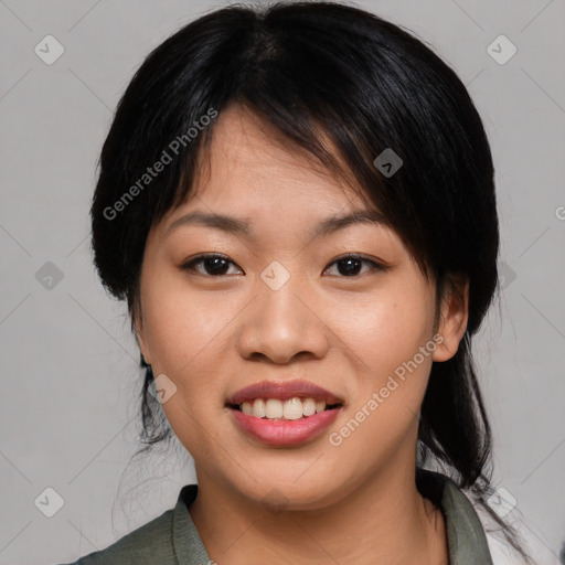 Joyful asian young-adult female with medium  brown hair and brown eyes