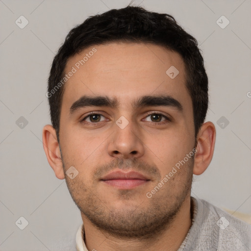 Neutral white young-adult male with short  brown hair and brown eyes