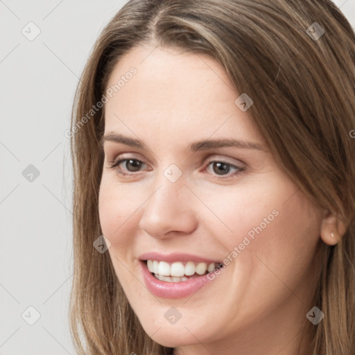 Joyful white young-adult female with long  brown hair and grey eyes