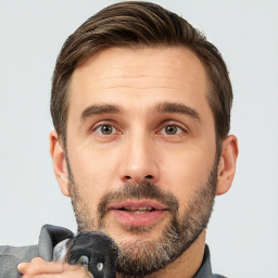 Neutral white adult male with short  brown hair and brown eyes