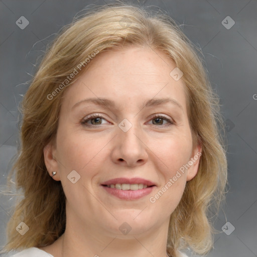 Joyful white adult female with medium  brown hair and grey eyes