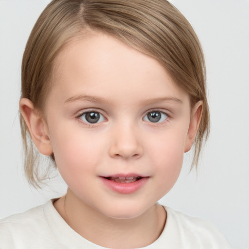 Joyful white child female with medium  brown hair and grey eyes