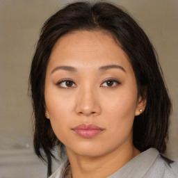 Neutral asian young-adult female with medium  brown hair and brown eyes