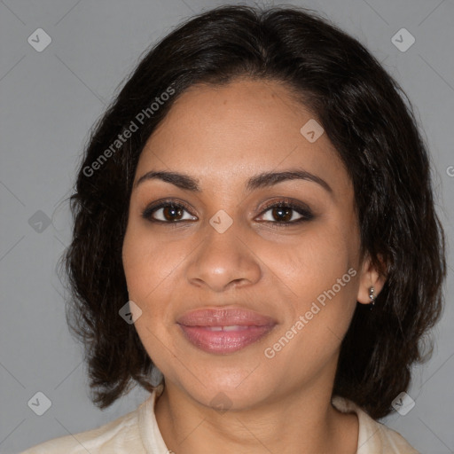 Joyful black young-adult female with medium  brown hair and brown eyes