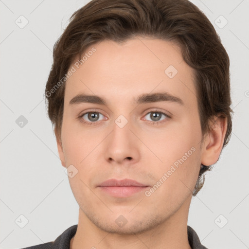 Neutral white young-adult male with short  brown hair and brown eyes