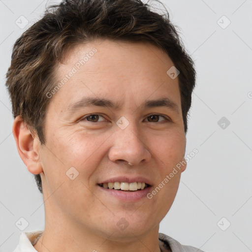 Joyful white adult male with short  brown hair and brown eyes