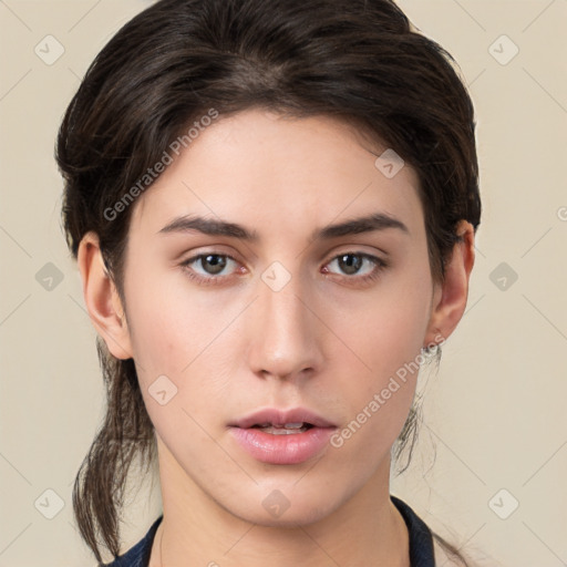 Neutral white young-adult female with medium  brown hair and brown eyes