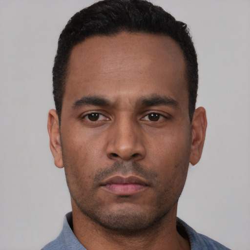 Neutral black young-adult male with short  black hair and brown eyes