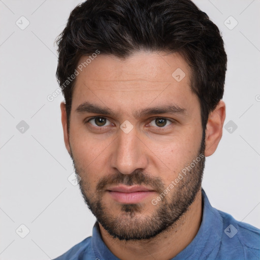 Neutral white young-adult male with short  brown hair and brown eyes