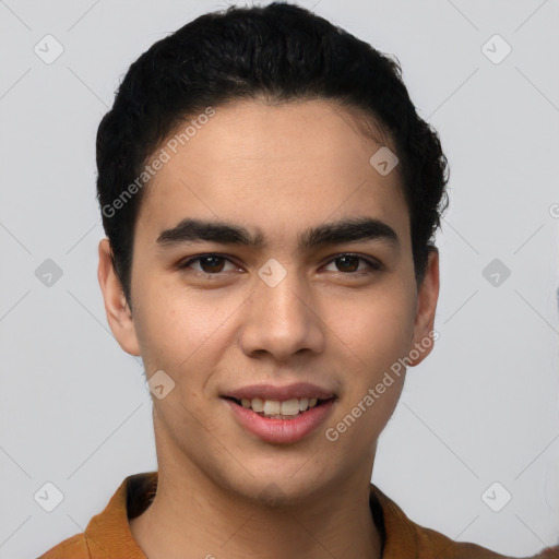 Joyful latino young-adult male with short  black hair and brown eyes