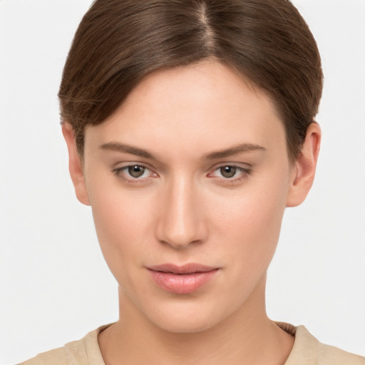 Neutral white young-adult female with short  brown hair and brown eyes