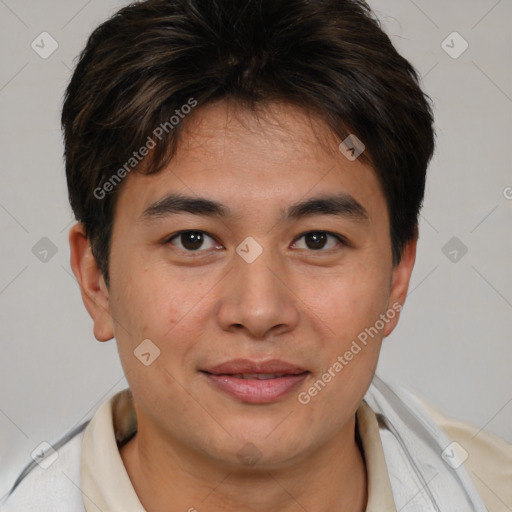 Joyful asian young-adult male with short  brown hair and brown eyes