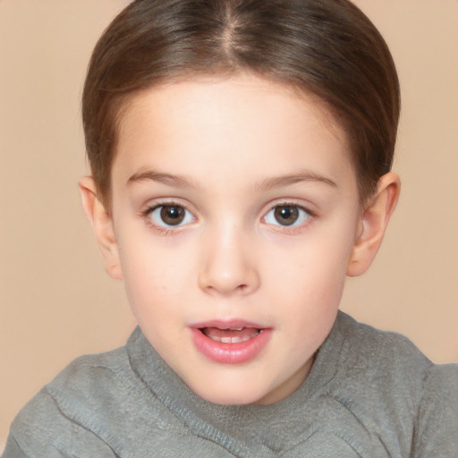 Joyful white child female with short  brown hair and brown eyes