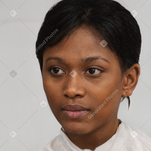 Neutral black young-adult female with short  black hair and brown eyes