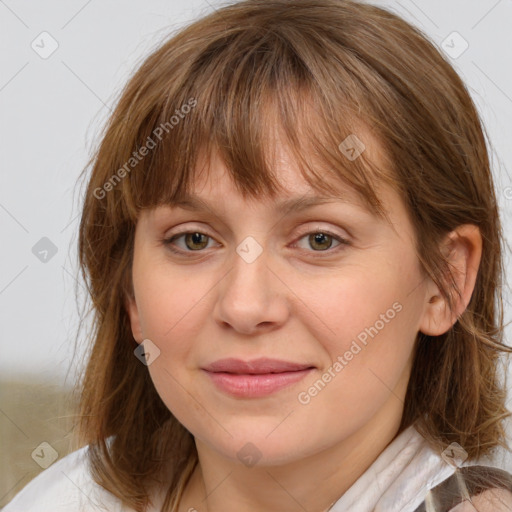 Joyful white young-adult female with medium  brown hair and blue eyes