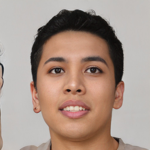 Joyful asian young-adult female with short  black hair and brown eyes