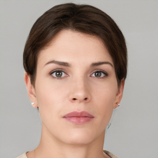 Neutral white young-adult female with short  brown hair and brown eyes