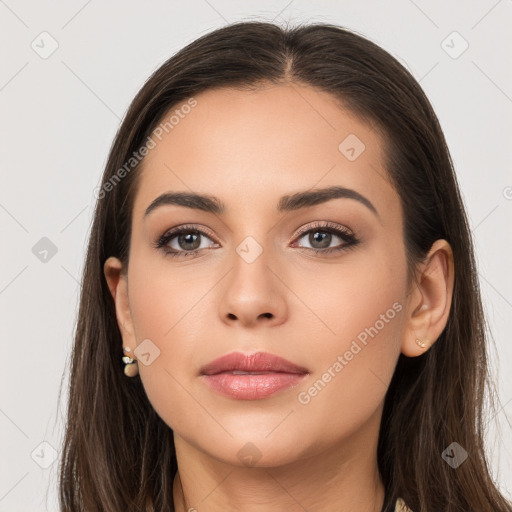 Neutral white young-adult female with long  brown hair and brown eyes