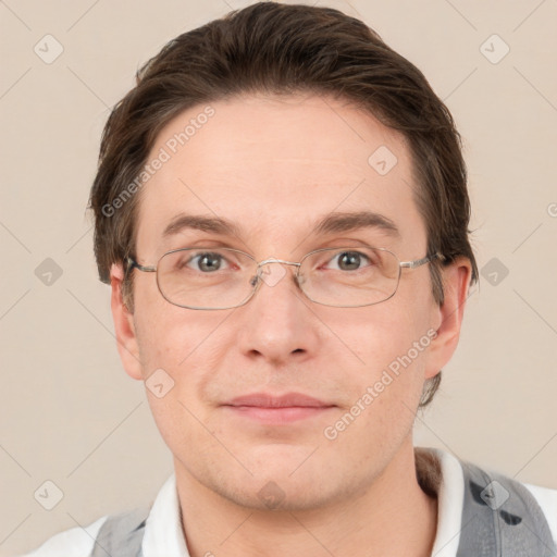 Joyful white adult male with short  brown hair and grey eyes