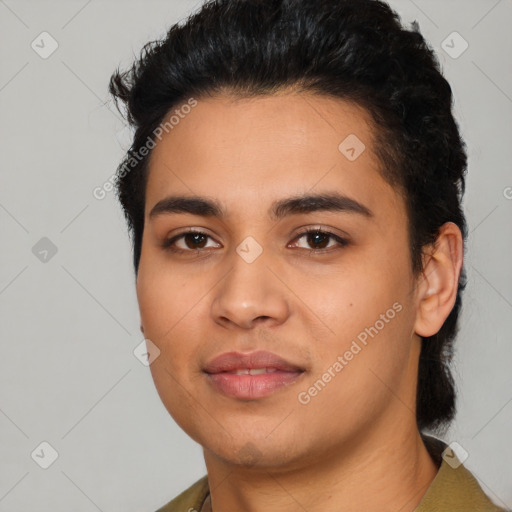 Joyful latino young-adult male with short  black hair and brown eyes