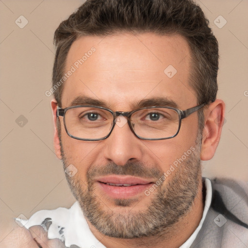 Joyful white adult male with short  brown hair and brown eyes