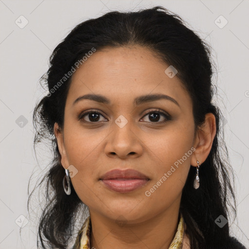 Joyful latino young-adult female with long  brown hair and brown eyes