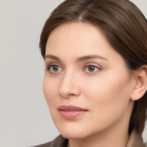 Neutral white young-adult female with medium  brown hair and brown eyes