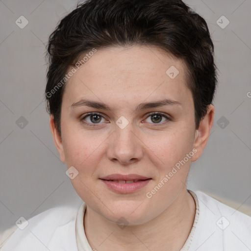 Joyful white young-adult female with short  brown hair and brown eyes