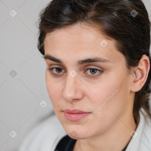 Neutral white young-adult female with medium  brown hair and brown eyes