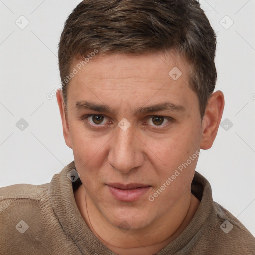 Joyful white adult male with short  brown hair and brown eyes