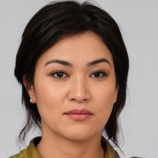 Neutral white young-adult female with medium  black hair and brown eyes