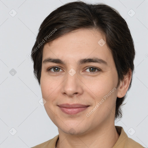 Joyful white young-adult female with medium  brown hair and brown eyes