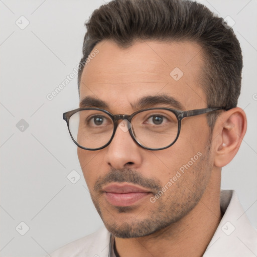 Neutral white young-adult male with short  brown hair and brown eyes