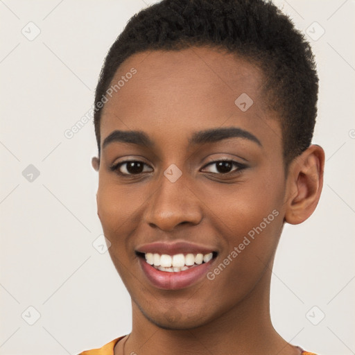 Joyful black young-adult female with short  brown hair and brown eyes