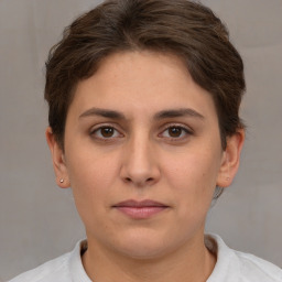 Neutral white young-adult female with short  brown hair and brown eyes