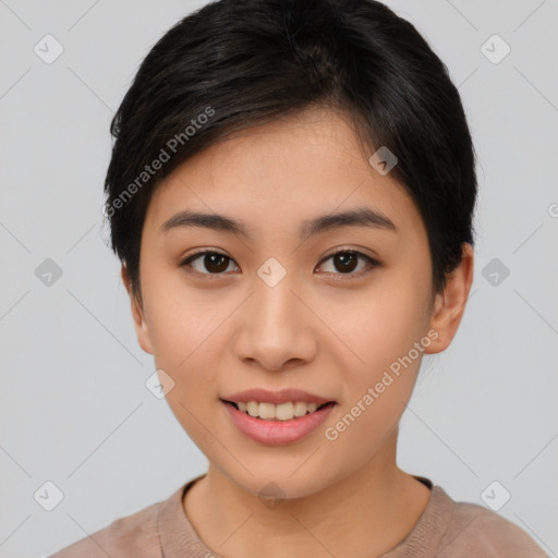 Joyful asian young-adult female with short  black hair and brown eyes