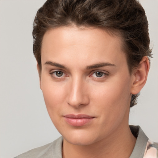 Neutral white young-adult female with short  brown hair and brown eyes