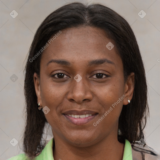 Joyful black young-adult female with medium  brown hair and brown eyes