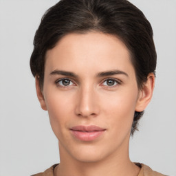 Neutral white young-adult female with short  brown hair and brown eyes