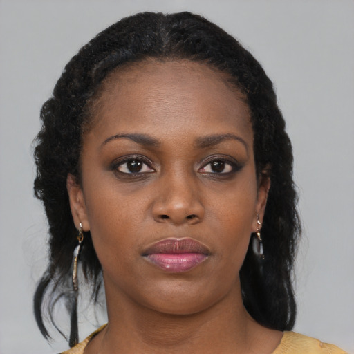 Neutral black young-adult female with long  black hair and brown eyes