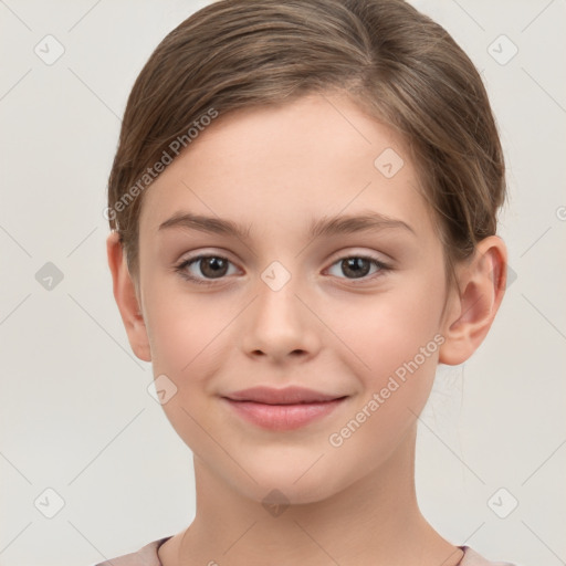 Joyful white child female with short  brown hair and brown eyes