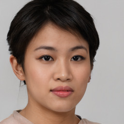 Neutral asian young-adult female with short  brown hair and brown eyes