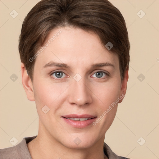 Joyful white young-adult female with short  brown hair and grey eyes