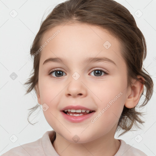 Joyful white child female with medium  brown hair and grey eyes