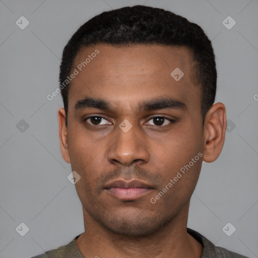 Neutral latino young-adult male with short  black hair and brown eyes