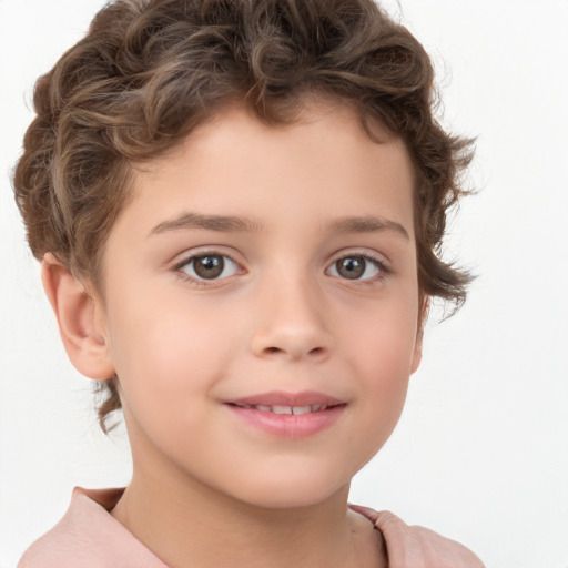 Joyful white child male with short  brown hair and brown eyes