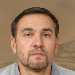 Neutral white adult male with short  brown hair and brown eyes