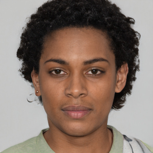 Neutral black young-adult female with short  black hair and brown eyes