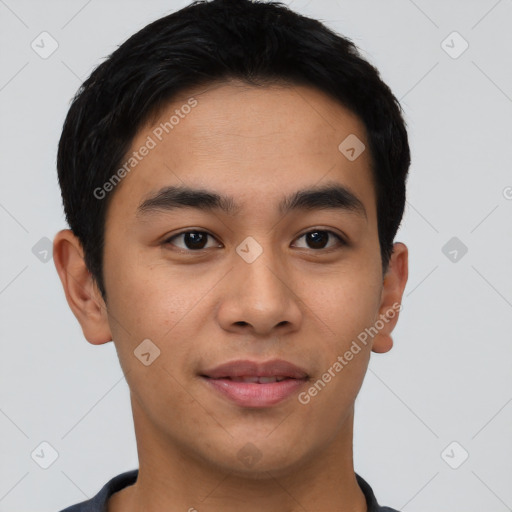 Joyful asian young-adult male with short  brown hair and brown eyes