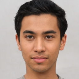 Neutral asian young-adult male with short  brown hair and brown eyes